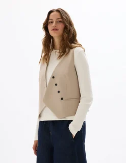 Mouwloos barmanvest - beige