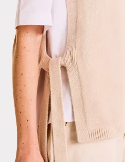 Mouwloze geknoopte trui - beige