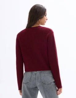 Rood vest met lange mouwen en knoopsluiting